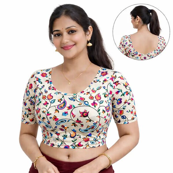 Woman wearing a colorful floral blouse with a close-up inset showing the back design.