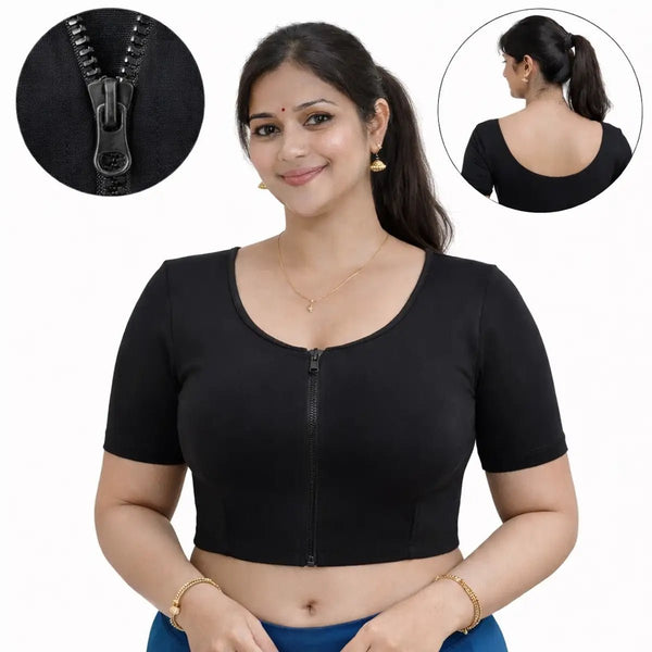 Woman wearing a black zip-up top with insets showing the front, back, and zipper details.